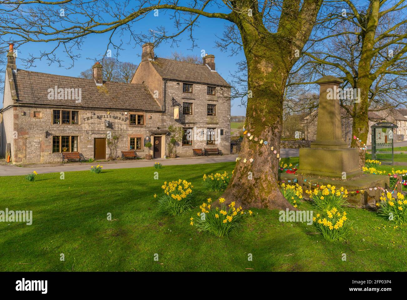 View of Bulls Head public house on village green, Monyash, Derbyshire