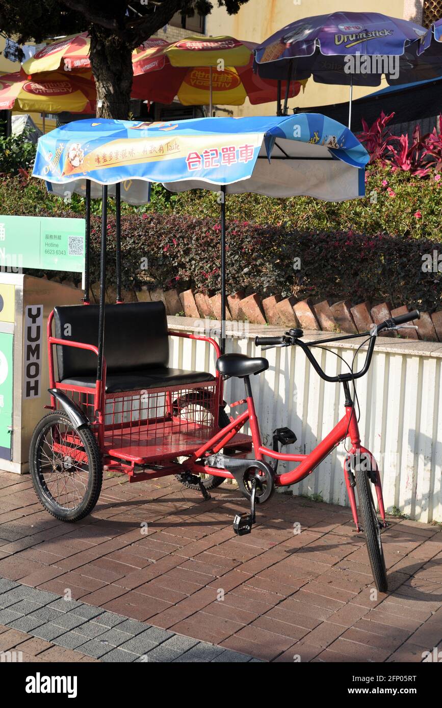 Recreational tricycle for rent in Cheung Chau, Hong Kong Stock Photo - Alamy