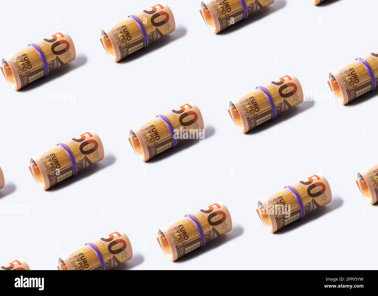 Euro 50 value banknotes roll pattern on gray background Stock Photo - Alamy
