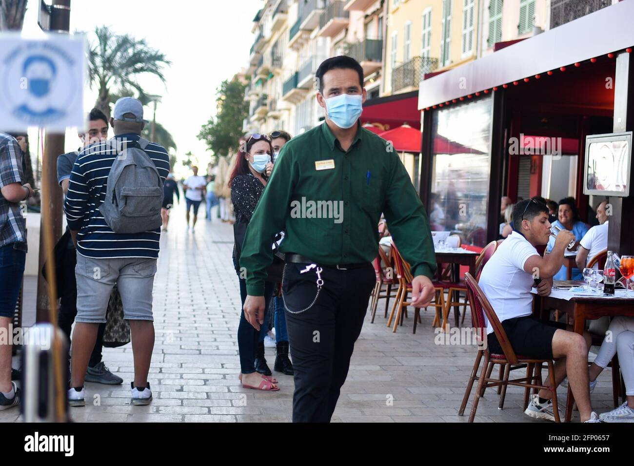 People enjoying outside weather as the reopening of cafes, bars and