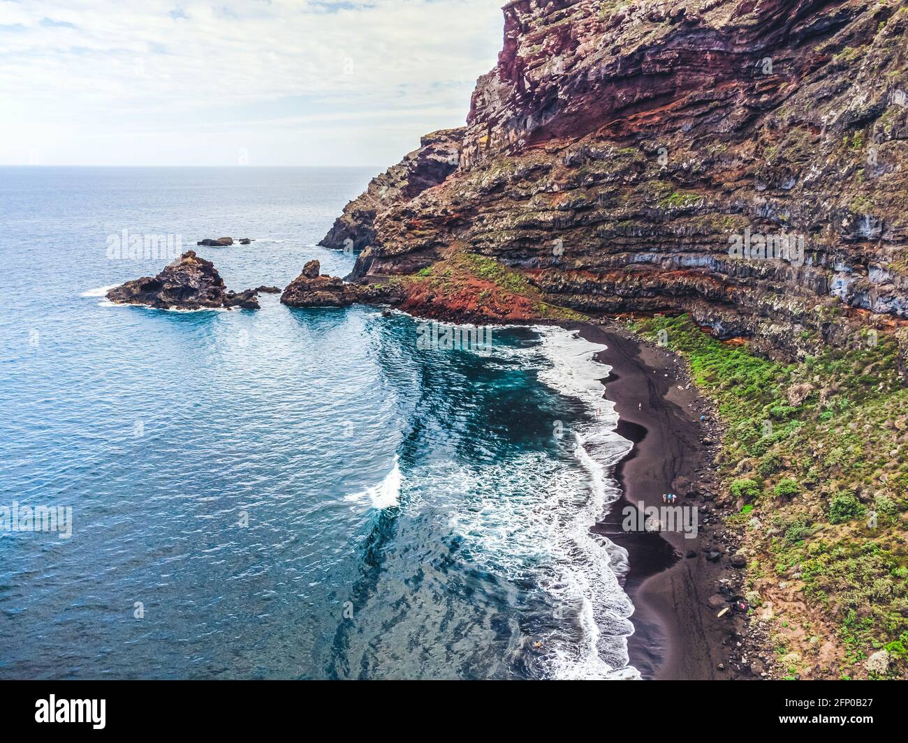Rocky, volcanic beach and unsettled atlantic ocean. La Palma Island. Aerial view. Stock Photo