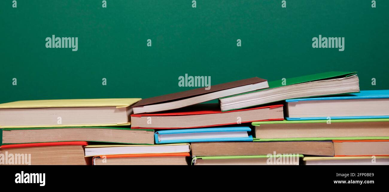 Composition with vintage old hardback books, colored background. Books ...