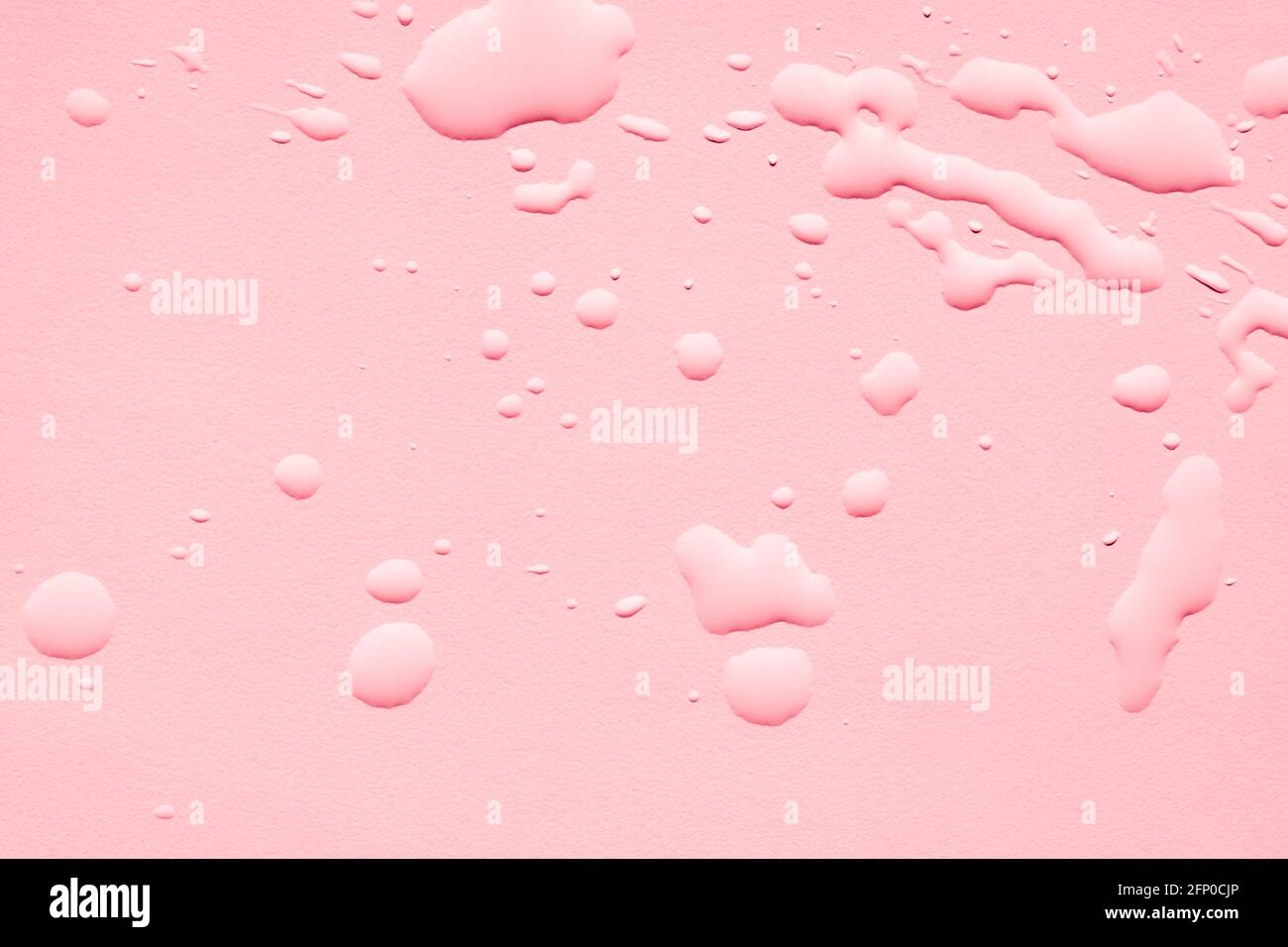 Close up of water drops on smooth surface, pink background Stock Photo ...