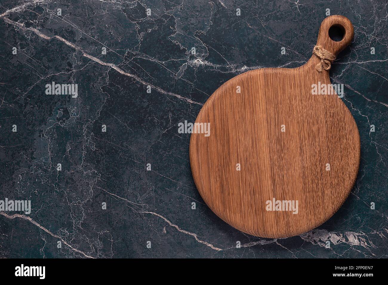cutting board on a marble table, top view Stock Photo