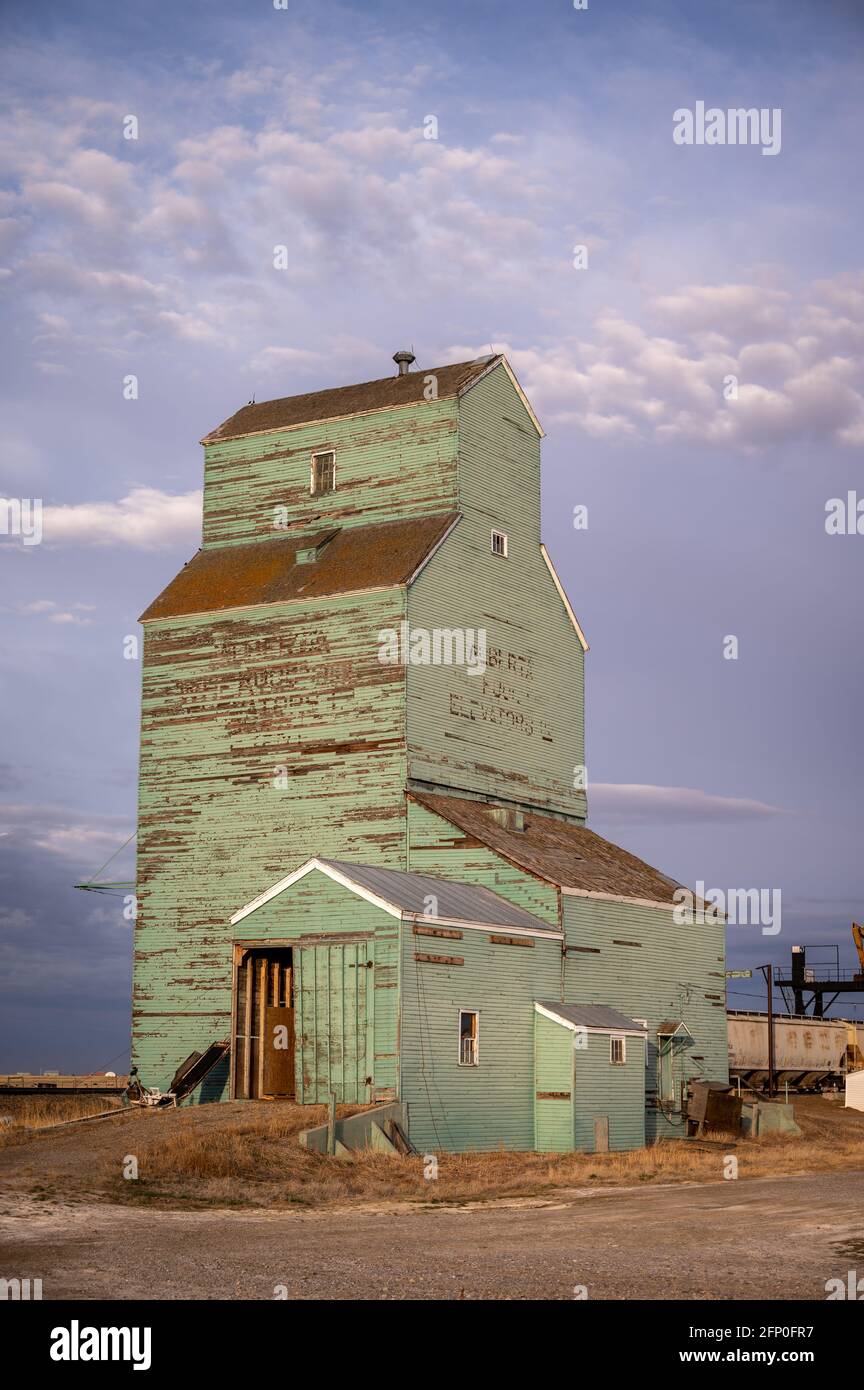 Brant, Alberta - May 7, 2021: Brant's old Alberta Wheat Pool grain elevator. Stock Photo