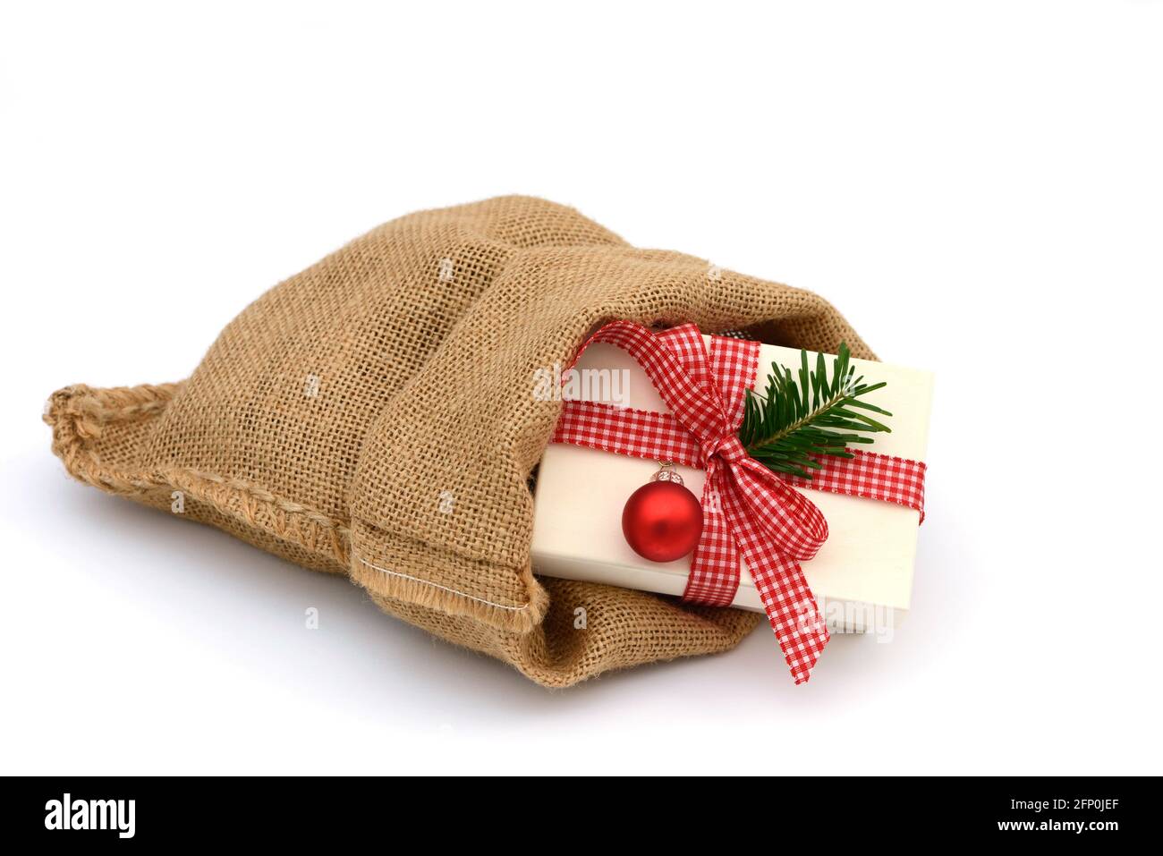 Xmas present in santa bag Stock Photo