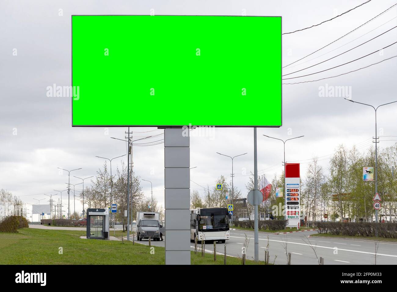 A billboard in the city. Copy space. In city street. Front view. Stock Photo