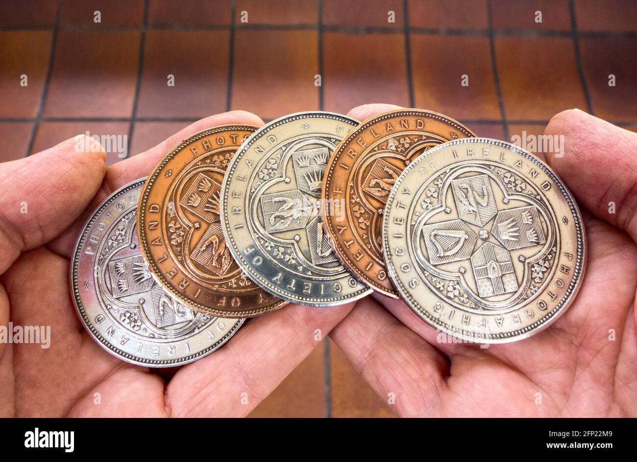 Medals awarded to competition winners of the Photographic Society of Ireland in the early 1900's Stock Photo
