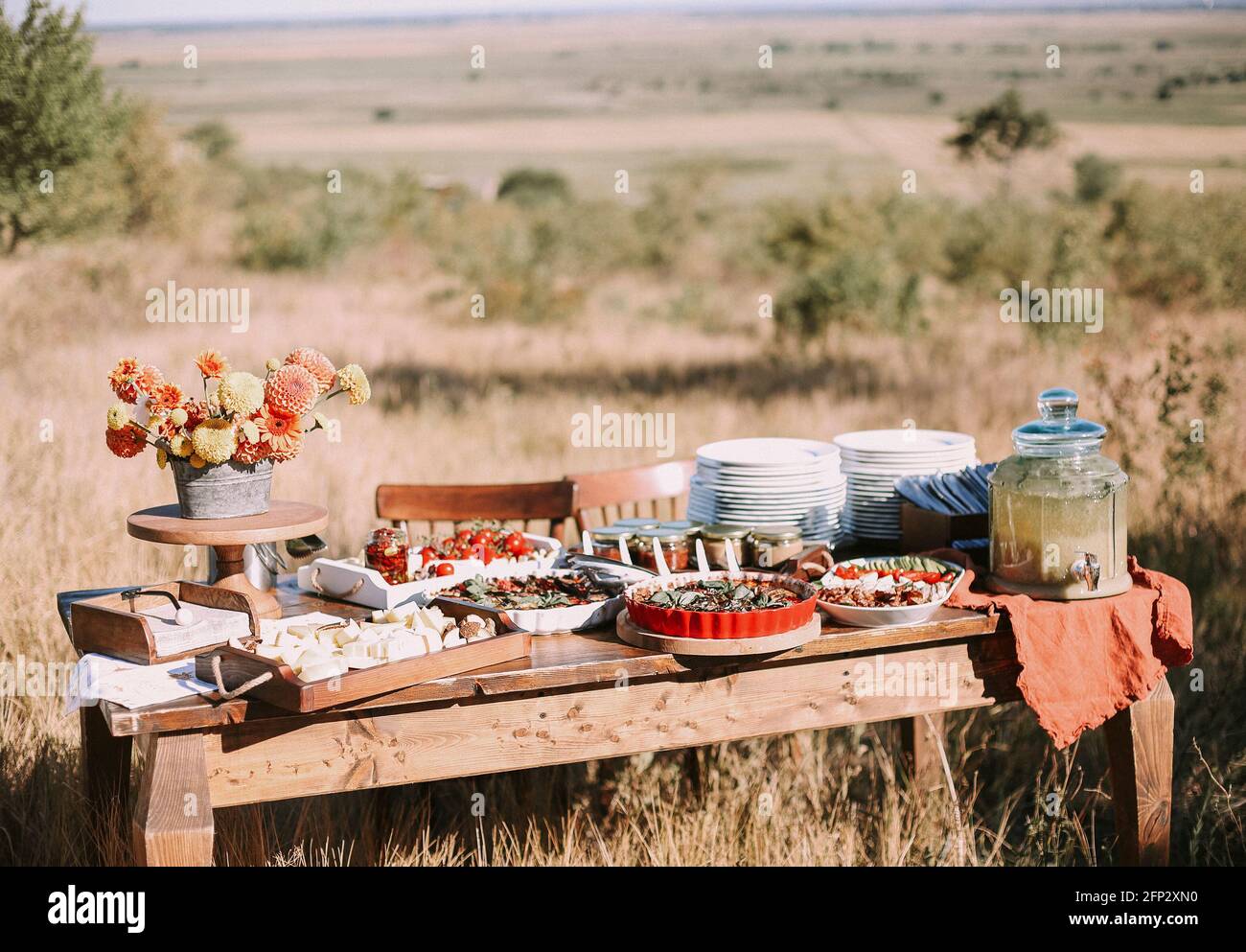 Catering bar with various snacks, buffet table during outdoor event Stock Photo