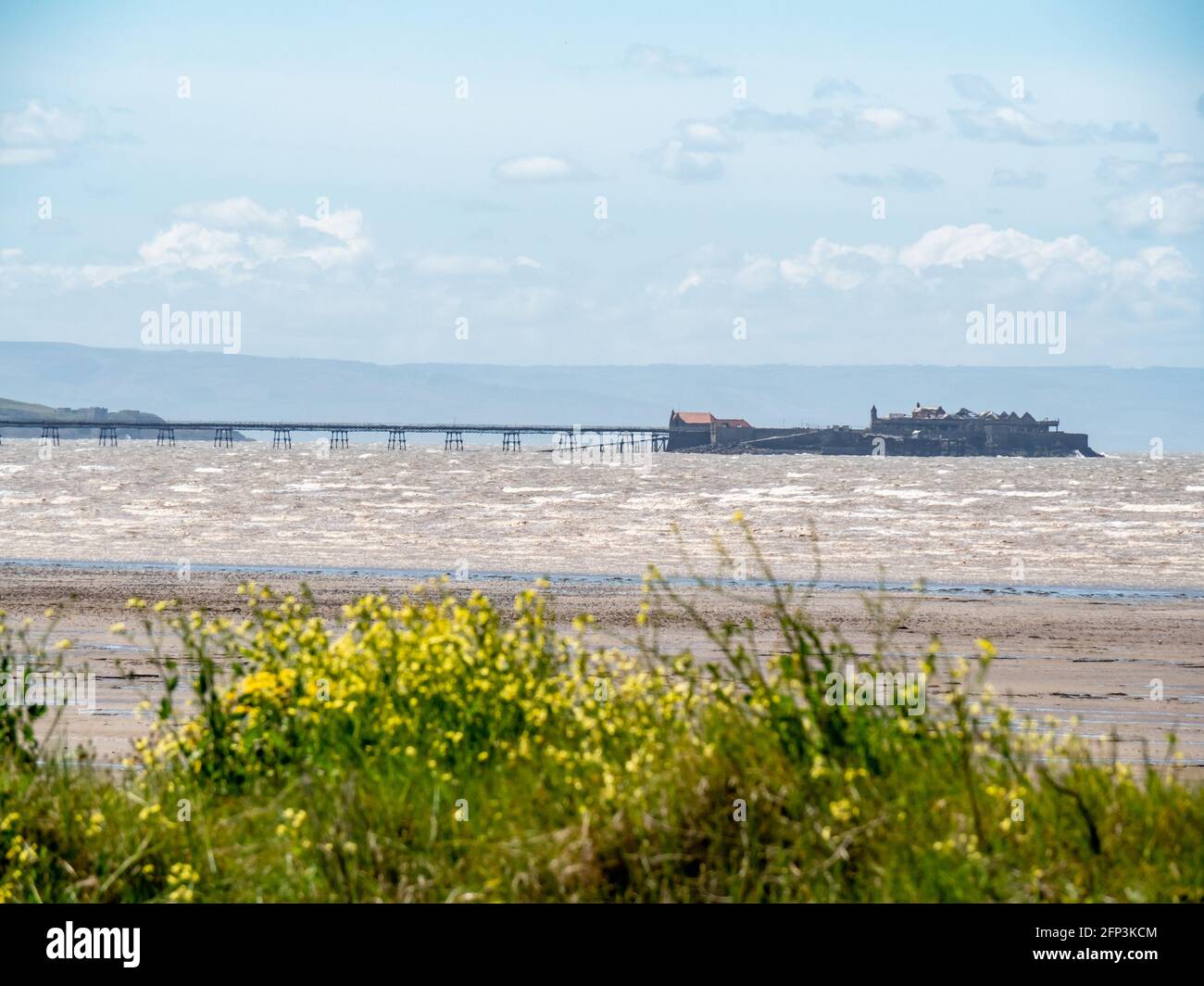 The old derelict Birnbeck Pier, near Weston-super-Mare, viewed from the dunes of Sand Bay in North Somerset Stock Photo