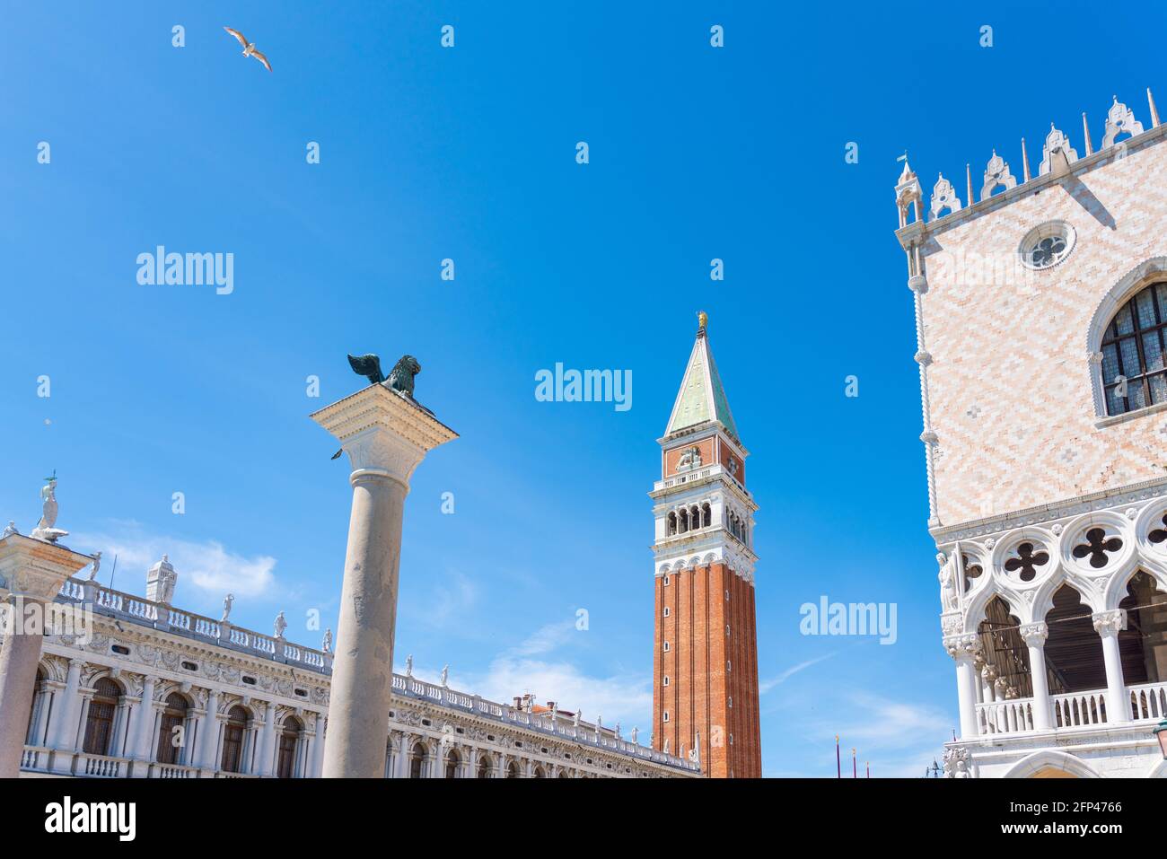 St Mark Square, campanile and buildings, blue sky. Venice, Italy Stock Photo