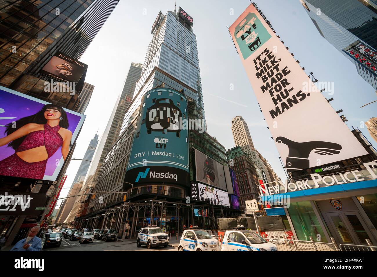 New York, USA. 20th May, 2021. The Nasdaq stock exchange and surrounding  billboards are decorated for the initial public offering of the Oatly brand  oat-milk in Times Square in New York on