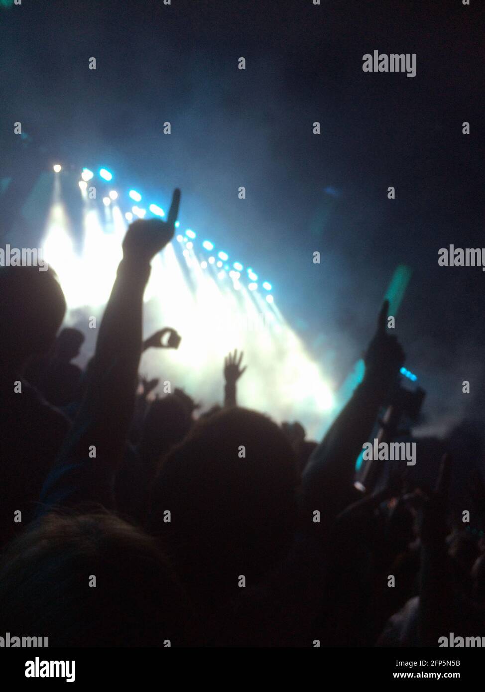 excited fans at pop concert in the dark Stock Photo - Alamy