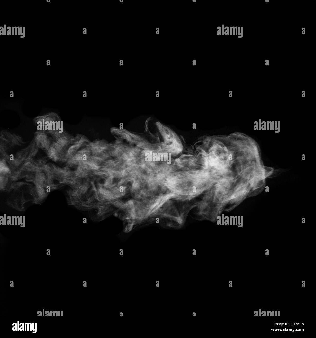 Horizontal curly white steam, fog or smoke isolated with transparent special effect on black background, square frame. Abstract background fog or smog Stock Photo