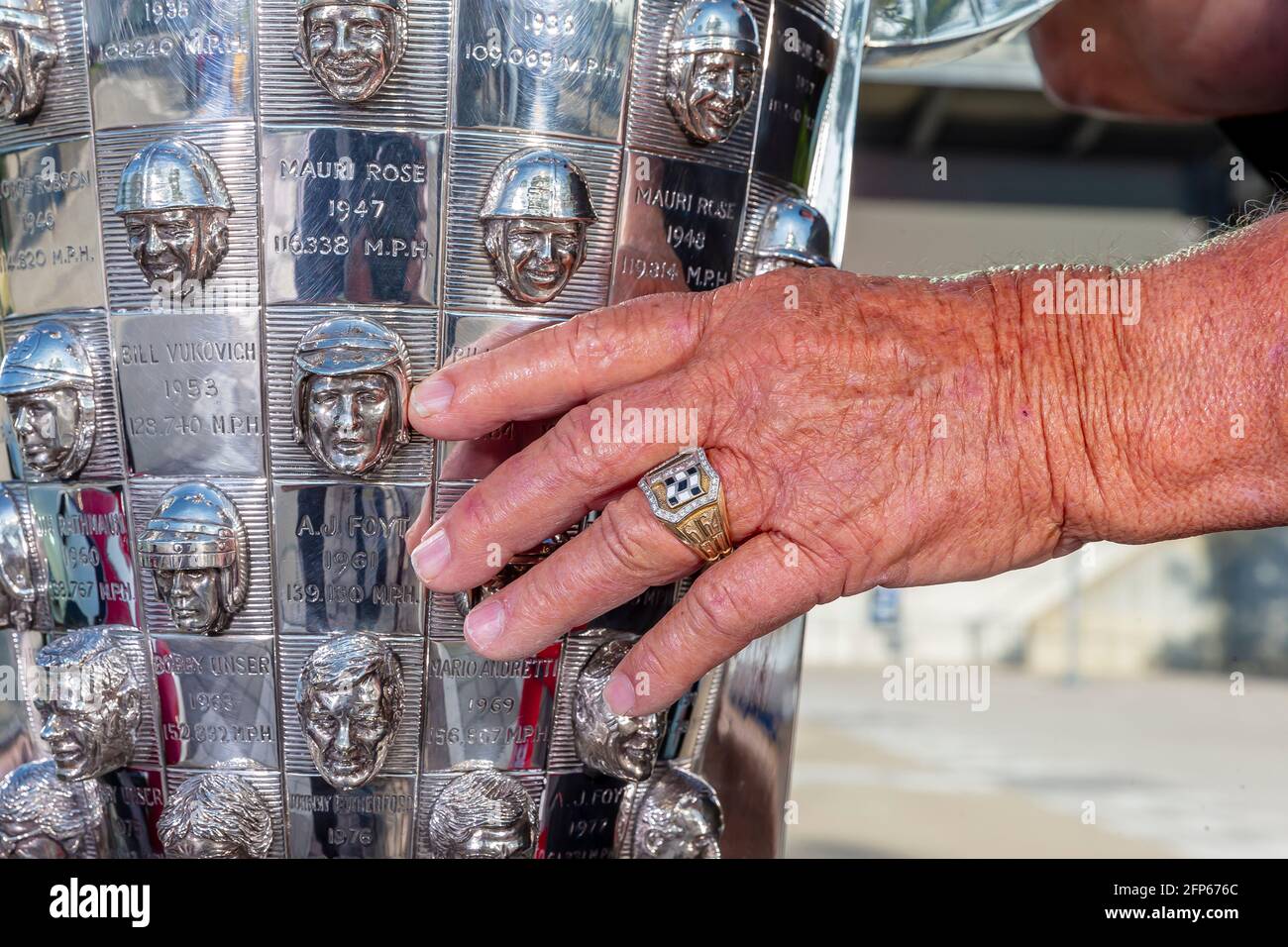 May 20, 2021, Indianapolis, Indiana, USA: 4 Time Indy500 winner, AJ Foyt, Jr poses with his 1961 winning car with the Borg Warner Trophy and his ABC Supply entry driven by JR Hildebrand. (Credit Image: © Brian Spurlock Grindstone Media/ASP via ZUMA Wire) Stock Photo