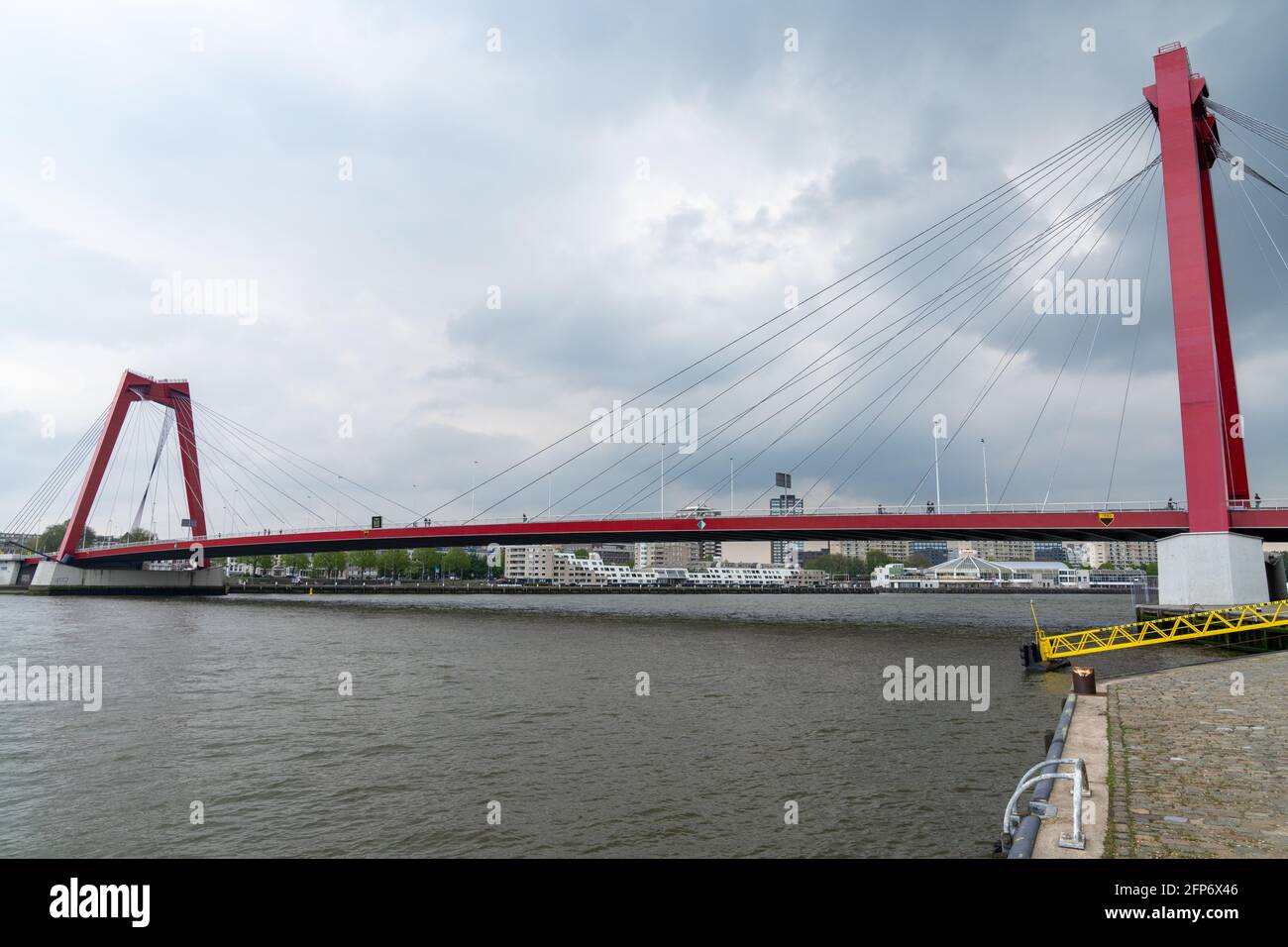Rotterdam, Netherlands - 14 May, 2021: view of the Willemsbrug over the Nieuwe Maas River in downtown Rotterdam Stock Photo