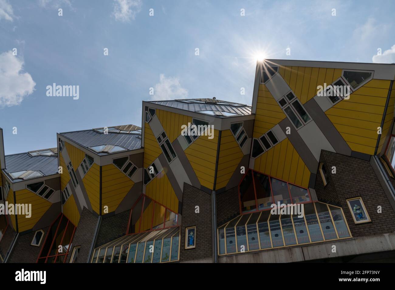 Rotterdam, Netherlands - 14 May, 2021: the iconic yellow cube houses in the city center of Rotterdam Stock Photo