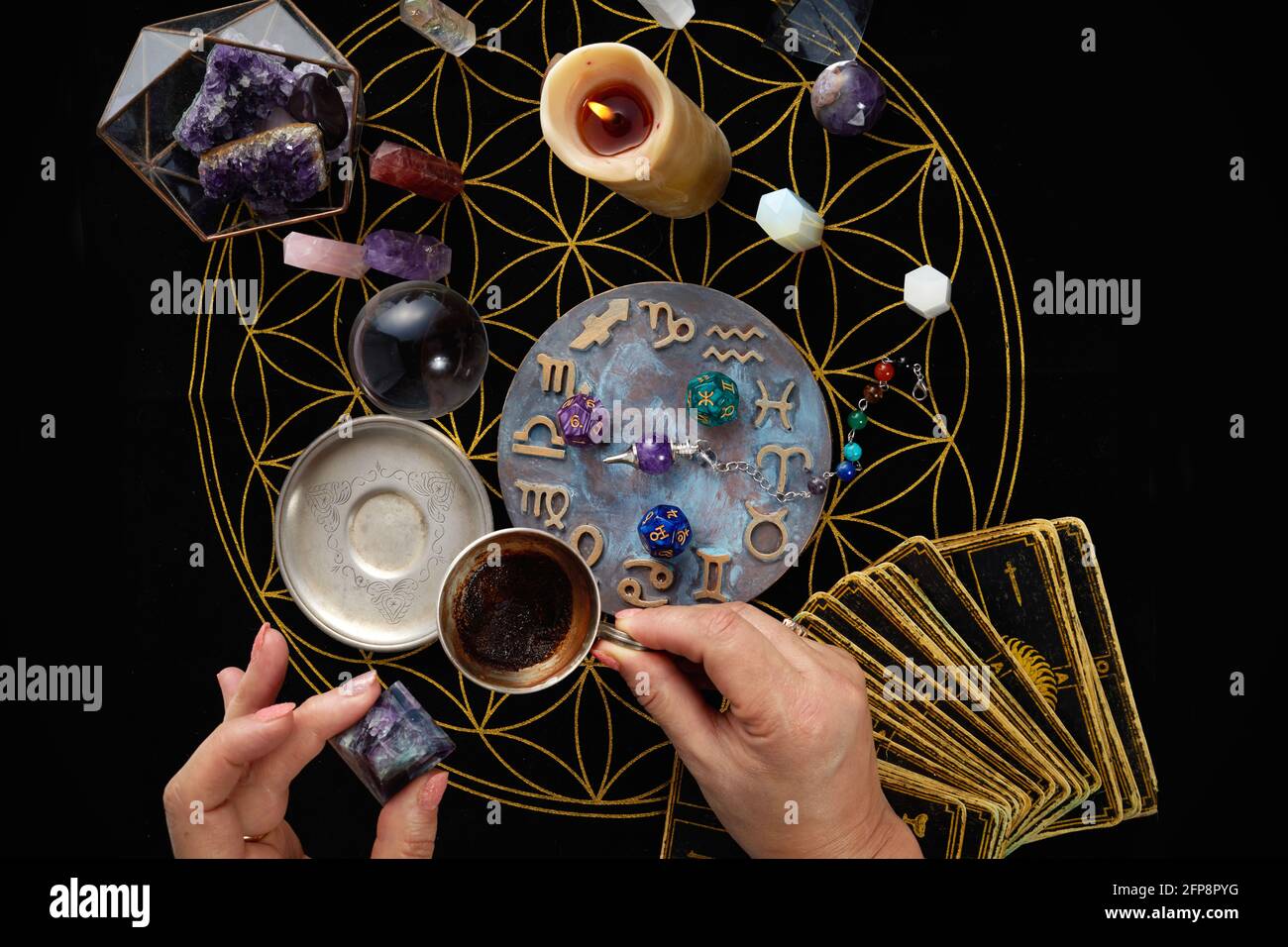 Fortune Telling Table with tarot cards and esoteric objects. Fortune