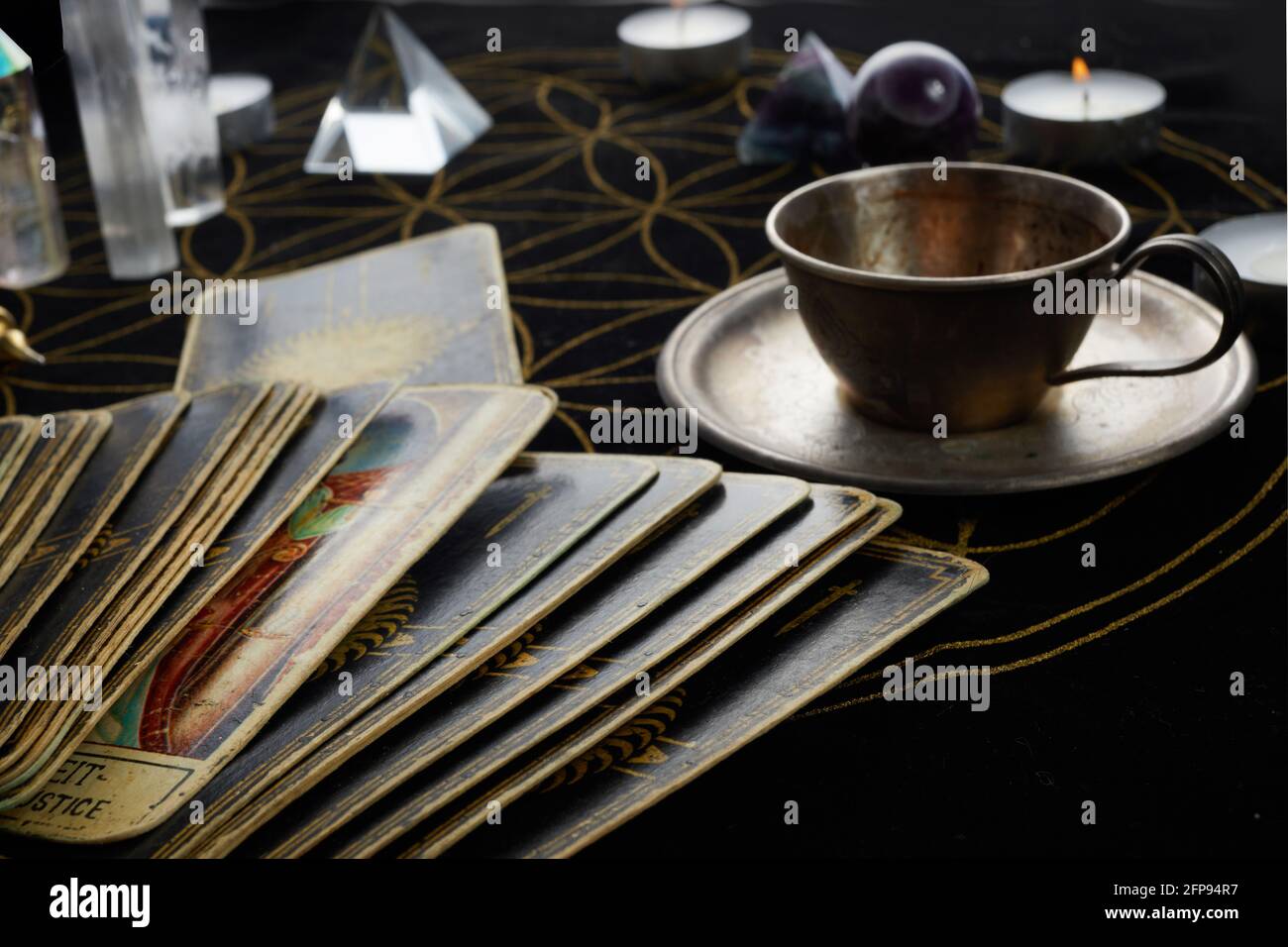 Fortune Telling Table with tarot cards and esoteric objects Stock Photo