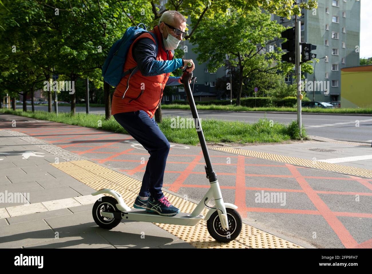 Warsaw, Warsaw, Poland. 20th May, 2021. A man rides an e-scooter on May 20,  2021 in Warsaw, Poland. The Polish parliament passed a bill that regulates  the usage of e-scooters in Poland