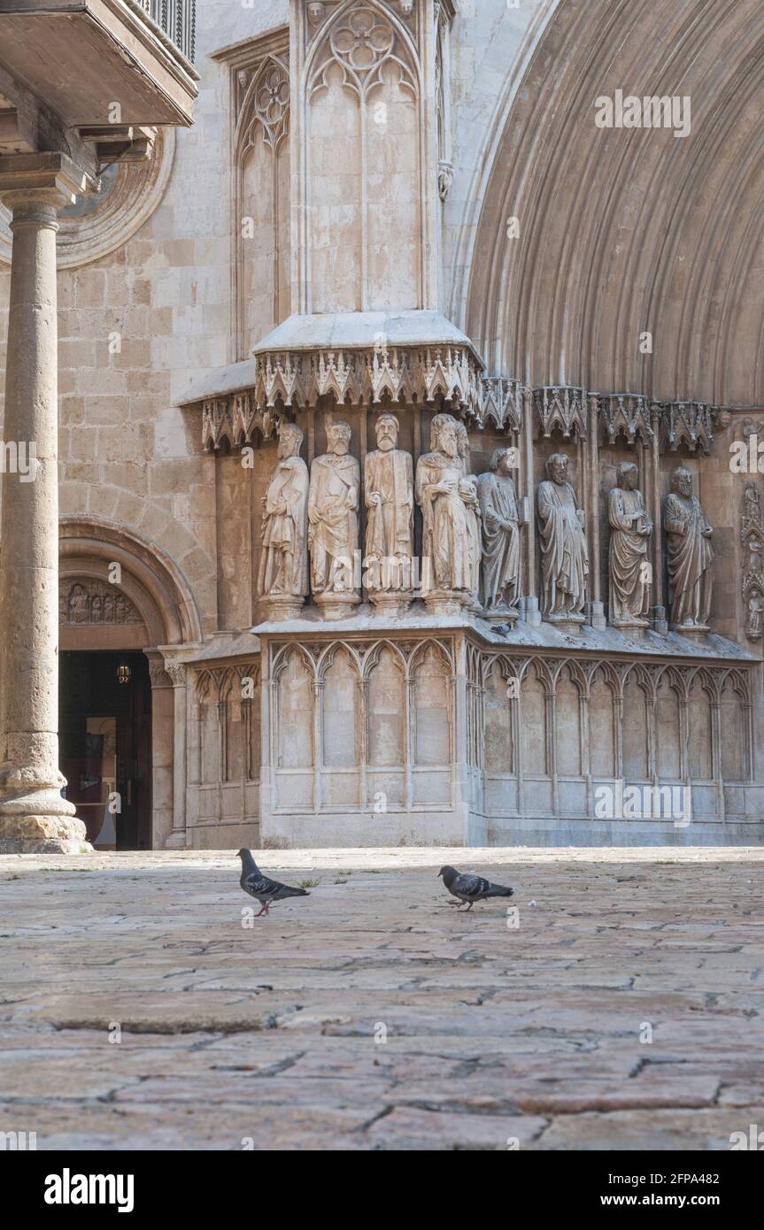 Sculptural figures of apostles and prophets in the central door of the Cathedral of Tarragona Stock Photo