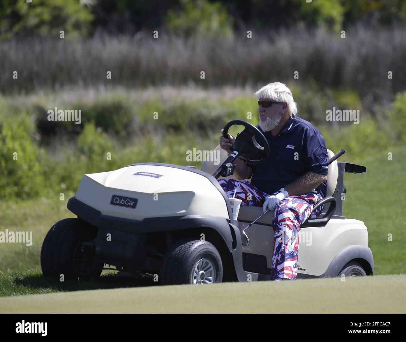 Kiawah Island, United States. 20th May, 2021. John Daly rides his golf cart  on the back 9 in the first round of the 103rd PGA Championship at Kiawah  Island Golf Resort Ocean