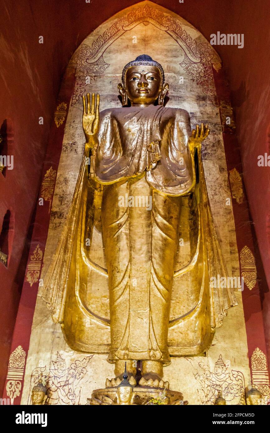Golden Buddha Statue At Ananda Temple In Bagan High Resolution Stock ...