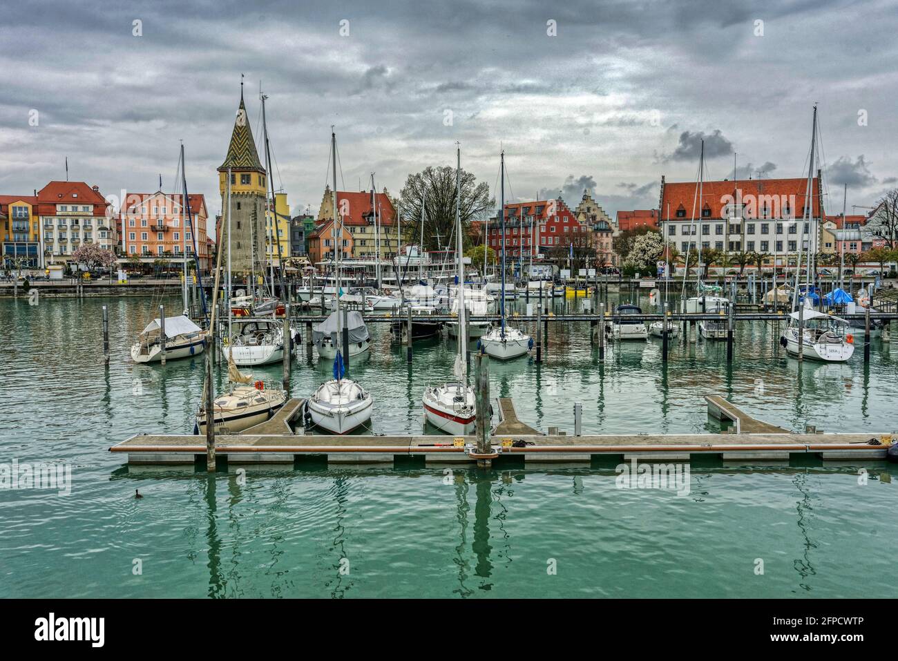Beautiful houses and parked boats in Lindau, Germany Stock Photo Alamy