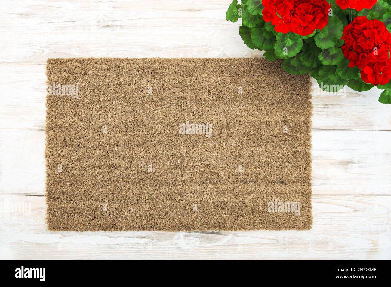 Coir doormat mock up with green plant decoration. Floral template mockup Stock Photo