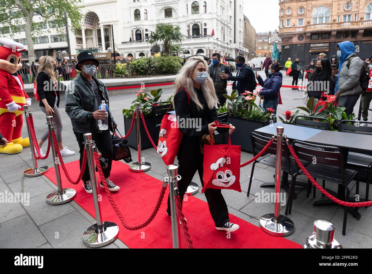 20 May 2021 .London, United Kingdom. Customers walk into the new