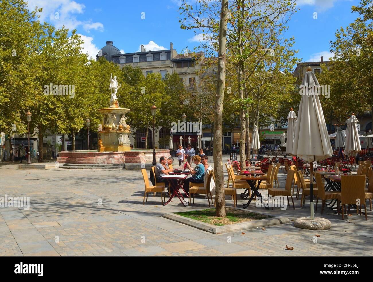 Cafe and monument in the town square at Carcassonne France. Stock Photo