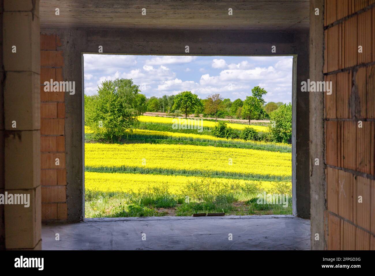 Beautiful rural landscape seen from the window of a newly built house. The concept of building a house outside the city. idyll Stock Photo