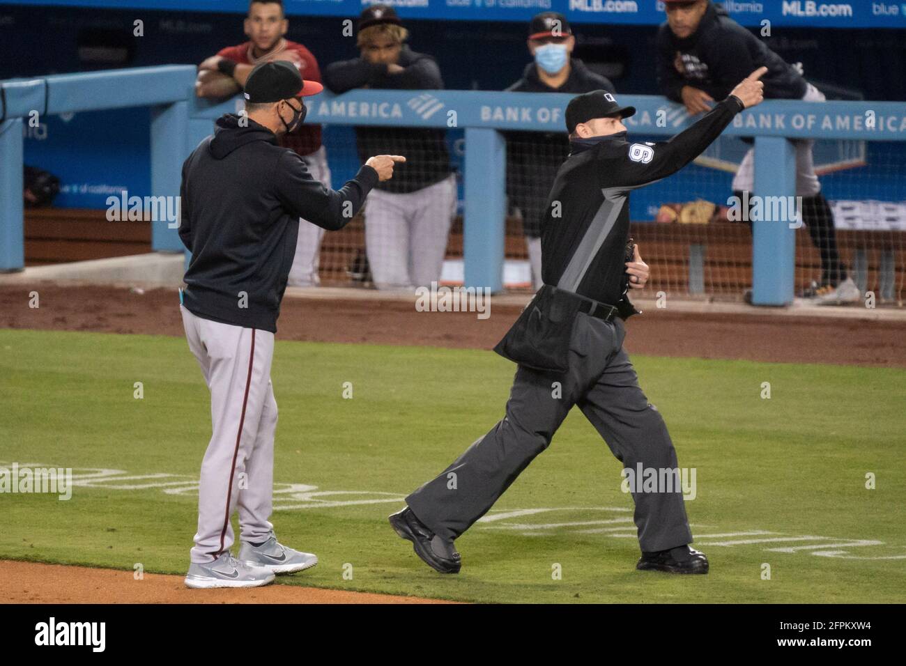 Arizona Diamondbacks manager Torey Lovullo (17) is thrown out by umpire Will Little (93) for arguing a call during a MLB game, Wednesday, May 19, 2021 Stock Photo