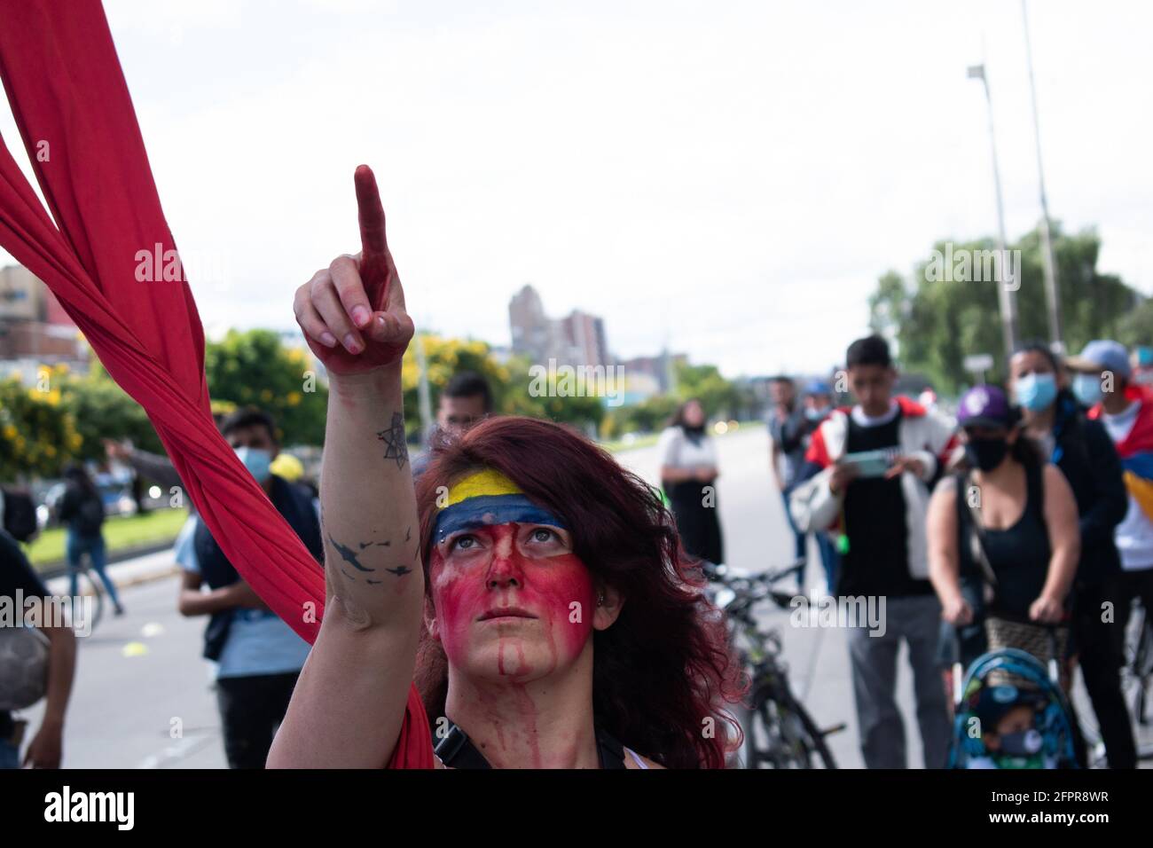 Bogota, Cundinamarca, Colombia. 19th May, 2021. People make a peformance against the police abuse while the demonstrations increase in Bogota on May 20, 2021 in the context of a national strike in Colombia against the tax reform and the government of Ivan Duque. Credit: Daniel Romero/LongVisual/ZUMA Wire/Alamy Live News Stock Photo