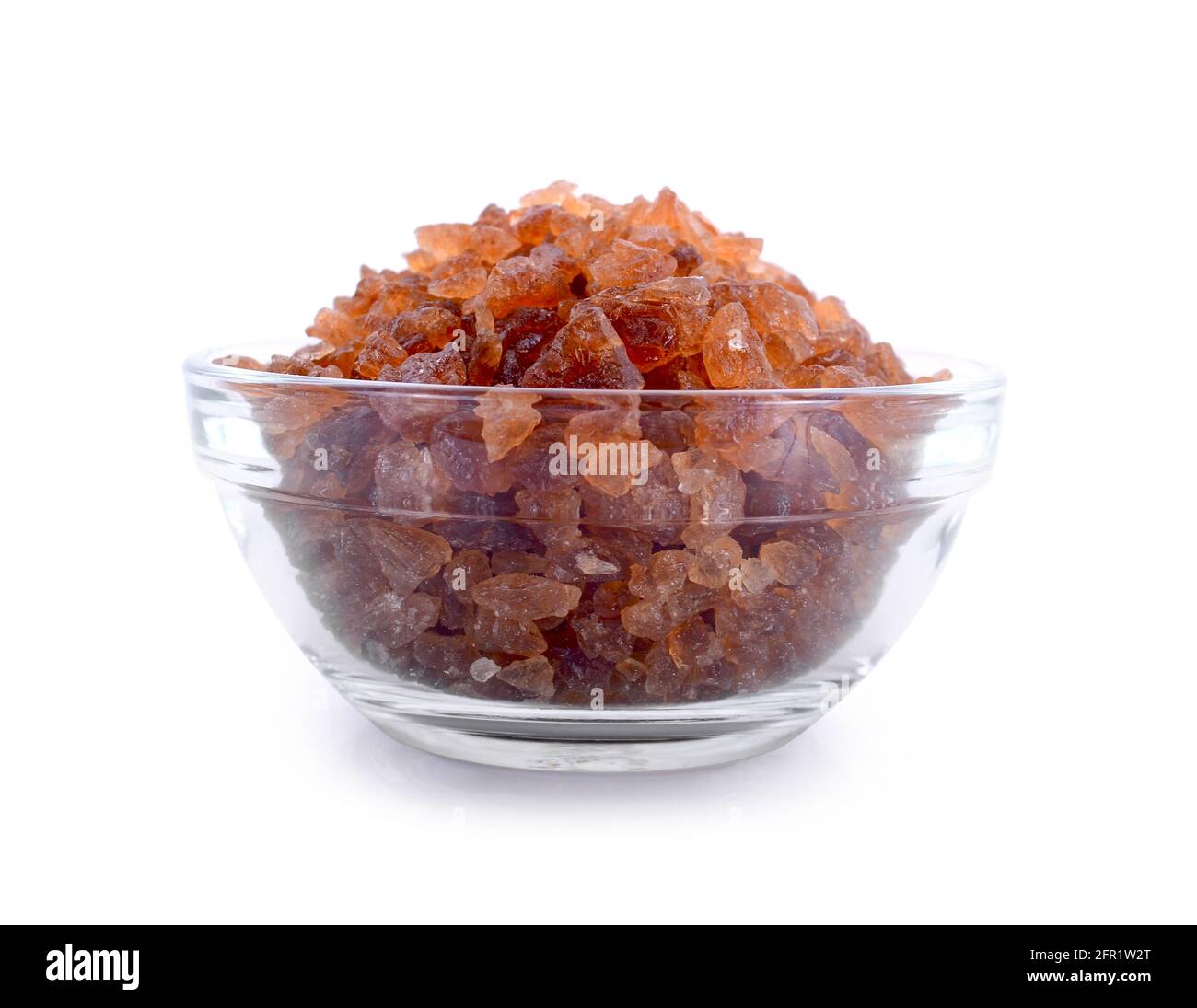 rock sugar in bowl on white background. Stock Photo