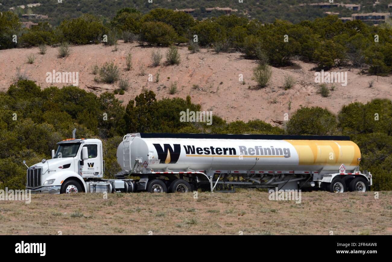 A Western Refining oil tanker travels along a highway in New Mexico. The company is a Fortune 200 crude oil refiner based in El Paso, Texas. Stock Photo