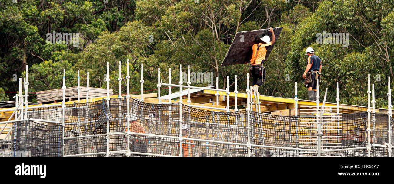 April 9, 2021.Construction progress. Installing concrete floor formwork on new home units development at 56-58 Beane St. Gosford.  Australia. Stock Photo