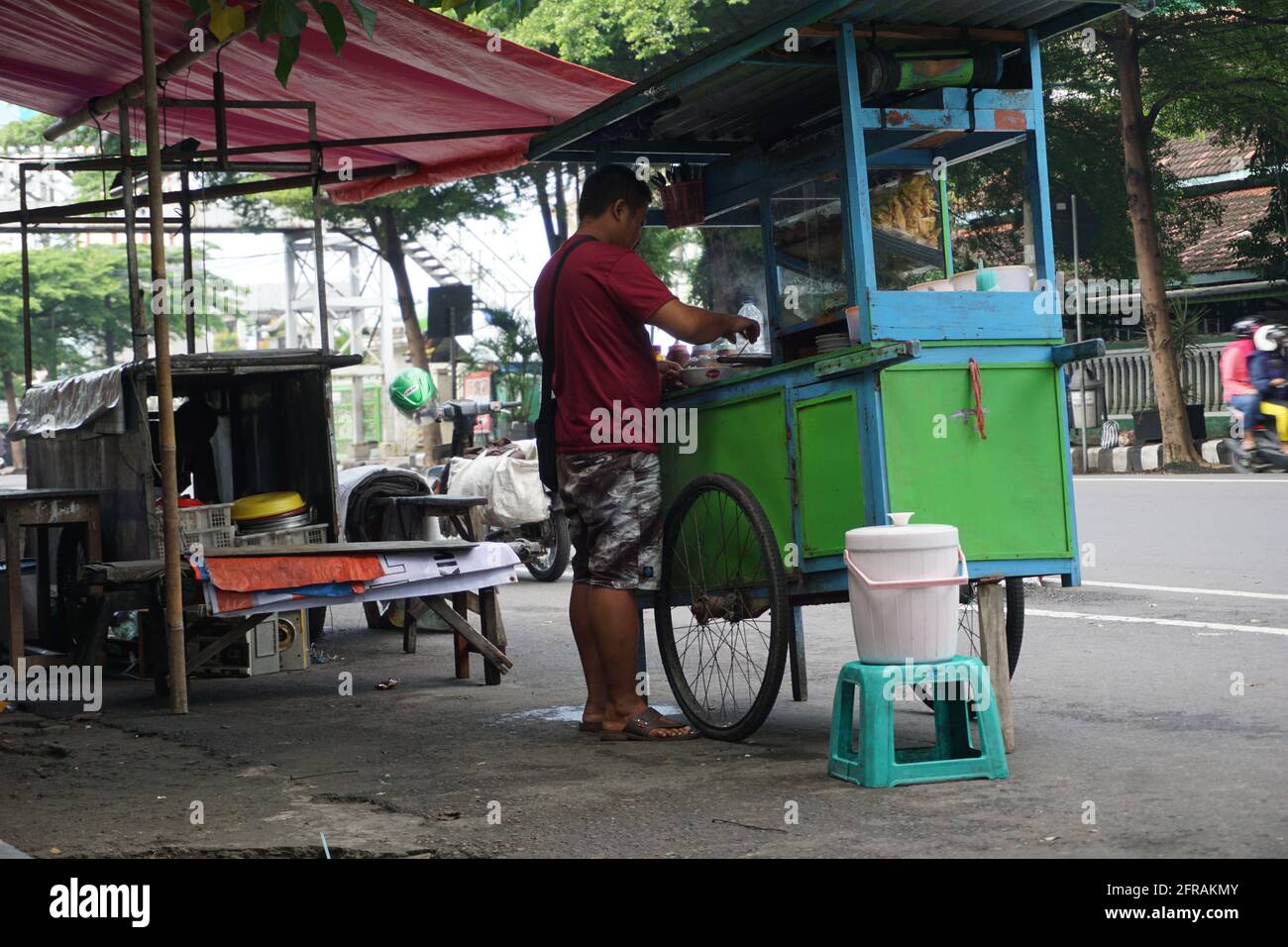 Indonesian street food seller Stock Photo