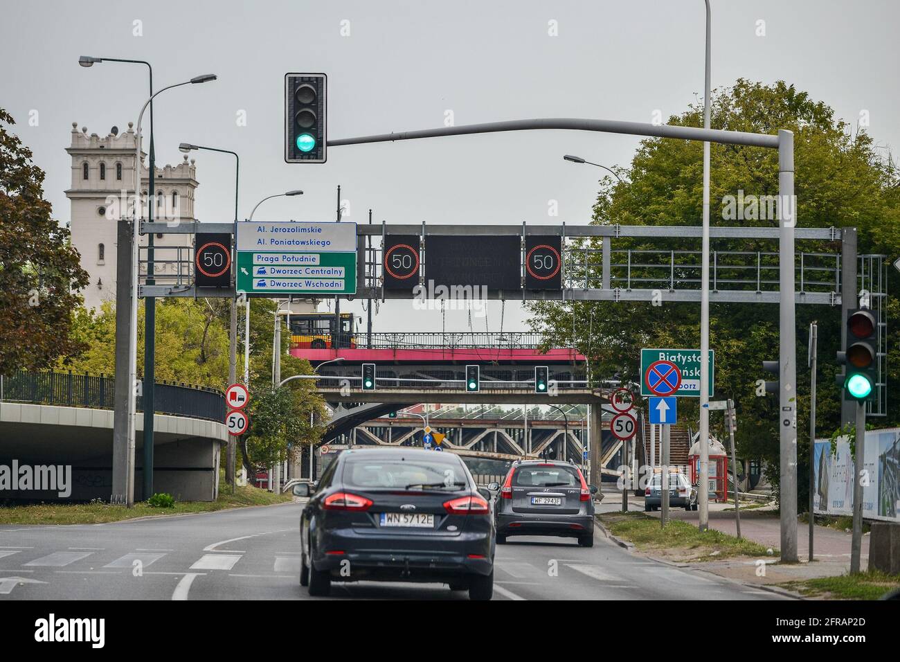 WARSAW. POLAND - AUGUST 2015: Road, speed limit signs, the traffic light shines green. High quality photo Stock Photo