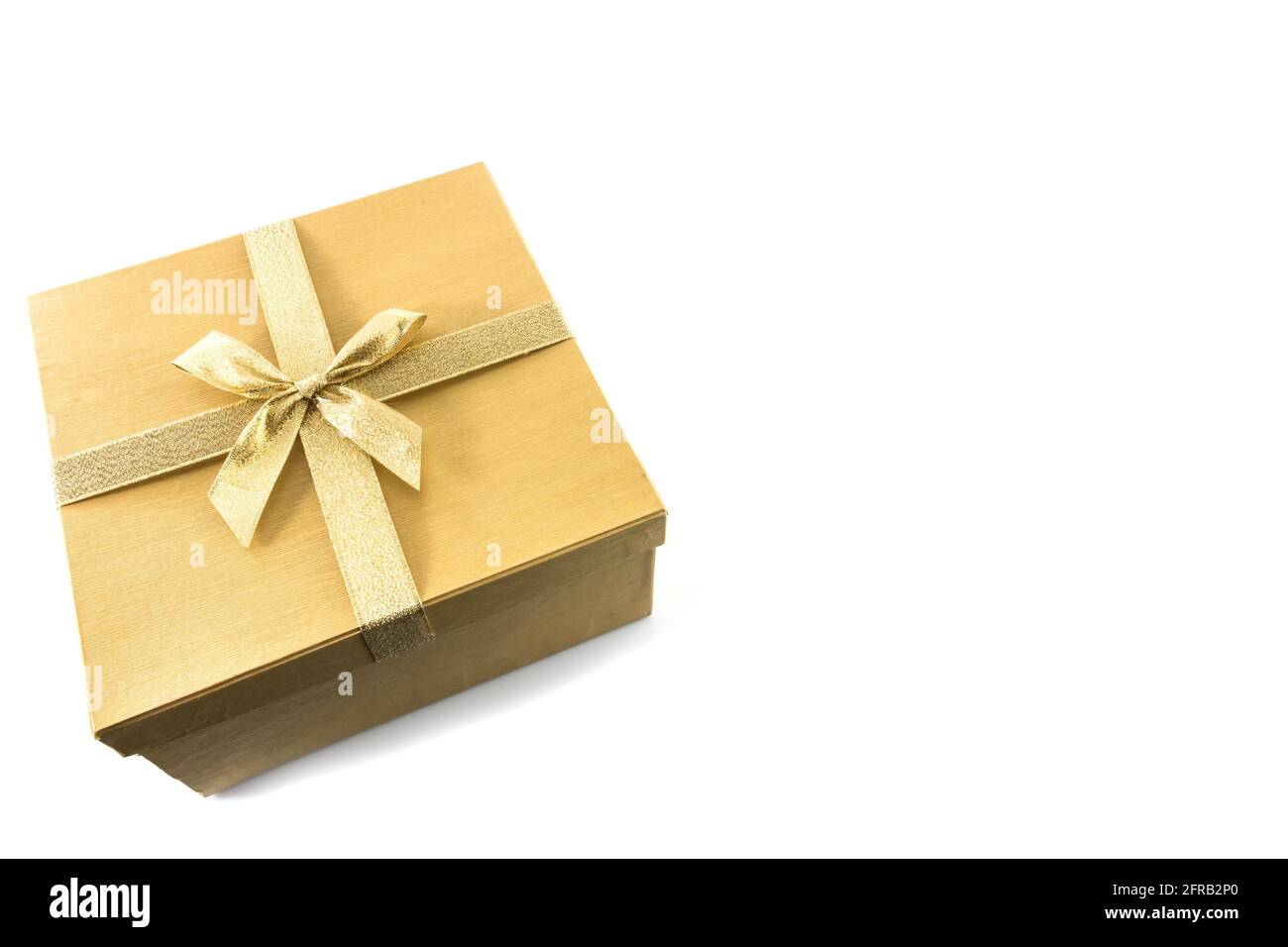 Golden gift box with golden ribbon on white background Stock Photo - Alamy