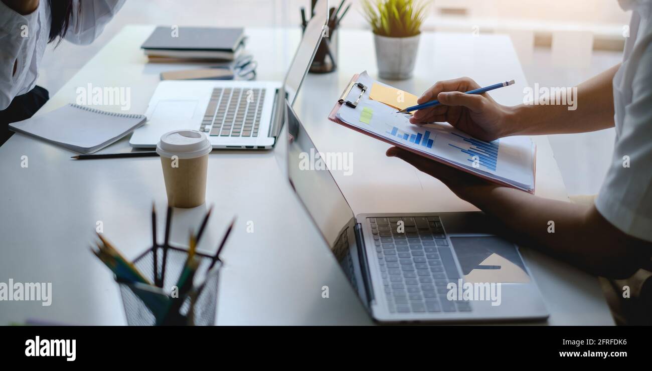 Fund managers team consultation and discuss about analysis Investment