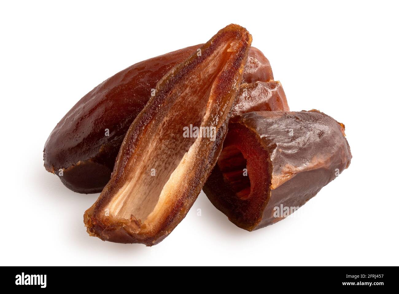 Whole and cut dry pitted dates isolated on white Stock Photo Alamy