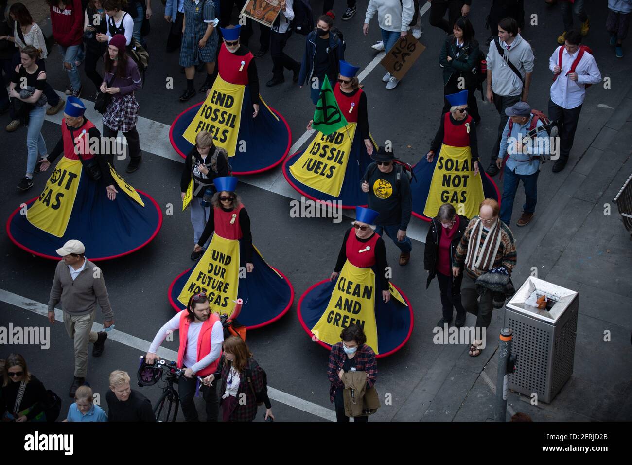 Melbourne, Australia 21 May 2021, Protesters in hop dresses during a rally that brought 1000s of school students and supporters to the streets  of Melbourne for the 'Schools Strike 4 Climate' protests that called on governments around the world to take action on Climate change. Credit: Michael Currie/Alamy Live News Stock Photo