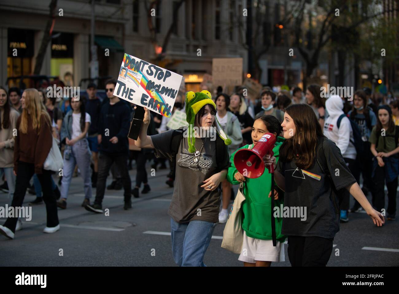 Melbourne, Australia 21 May 2021, Protesters on Collins street during a rally that brought 1000s of school students and supporters to the streets  of Melbourne for the 'Schools Strike 4 Climate' protests that called on governments around the world to take action on Climate change. Credit: Michael Currie/Alamy Live News Stock Photo