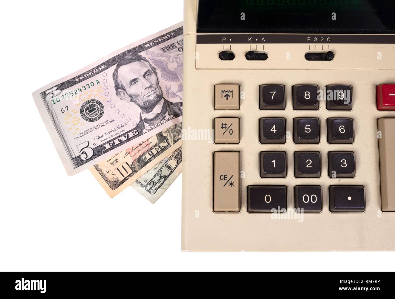 Old fashioned calculator dollars, isolated on white Stock Photo
