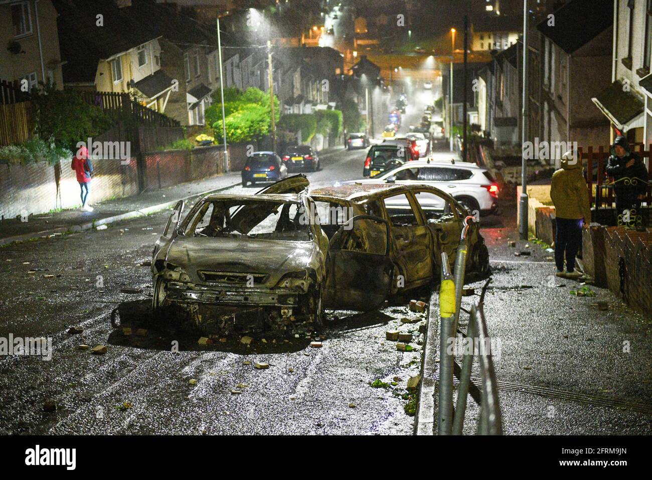 The aftermath of a riot in the Mayhill area of Swansea, which saw police attacked and several cars in the area torched during large scale disorder on the council estate. It is believed locals reacted when police turned up to a memorial that was taking place for a local man who had recently died. Stock Photo