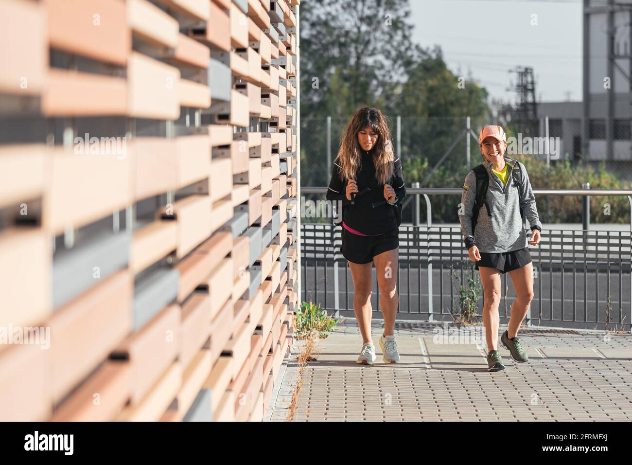 Multiethnic women going to the gym for physical exercise. Two girls