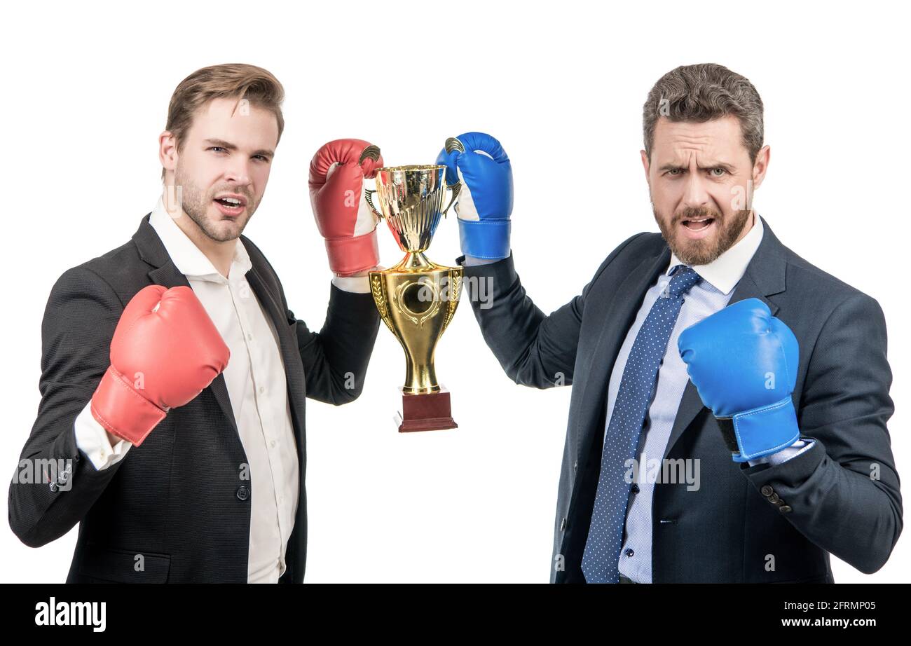 trophy and prestige. got prize. winning deal. businessmen in boxing gloves celebrate victory. Stock Photo