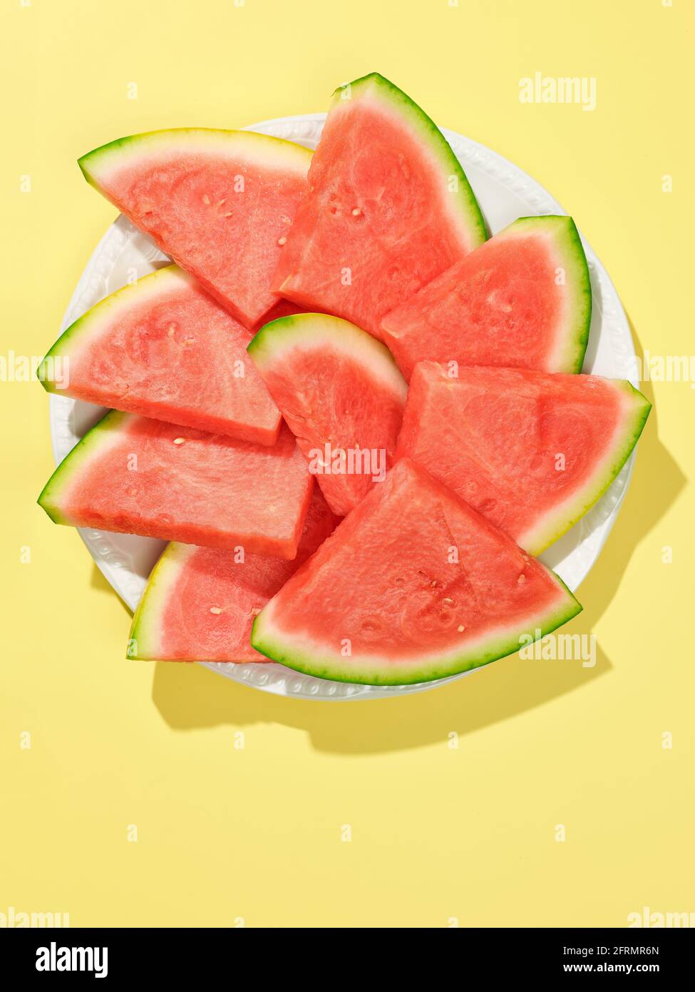 watermelon slices on white plate, top view Stock Photo