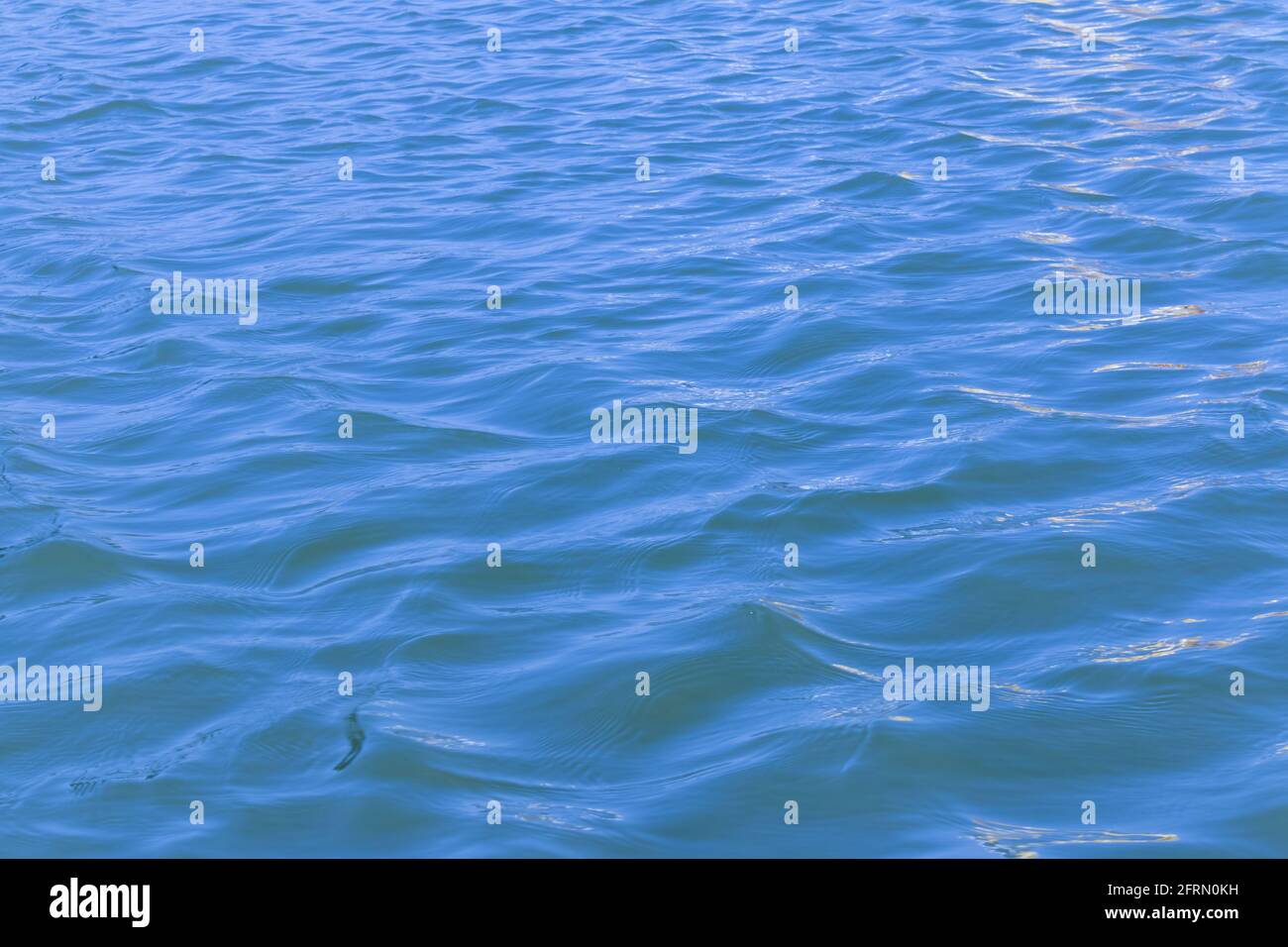 blue water with waving surface background Stock Photo - Alamy